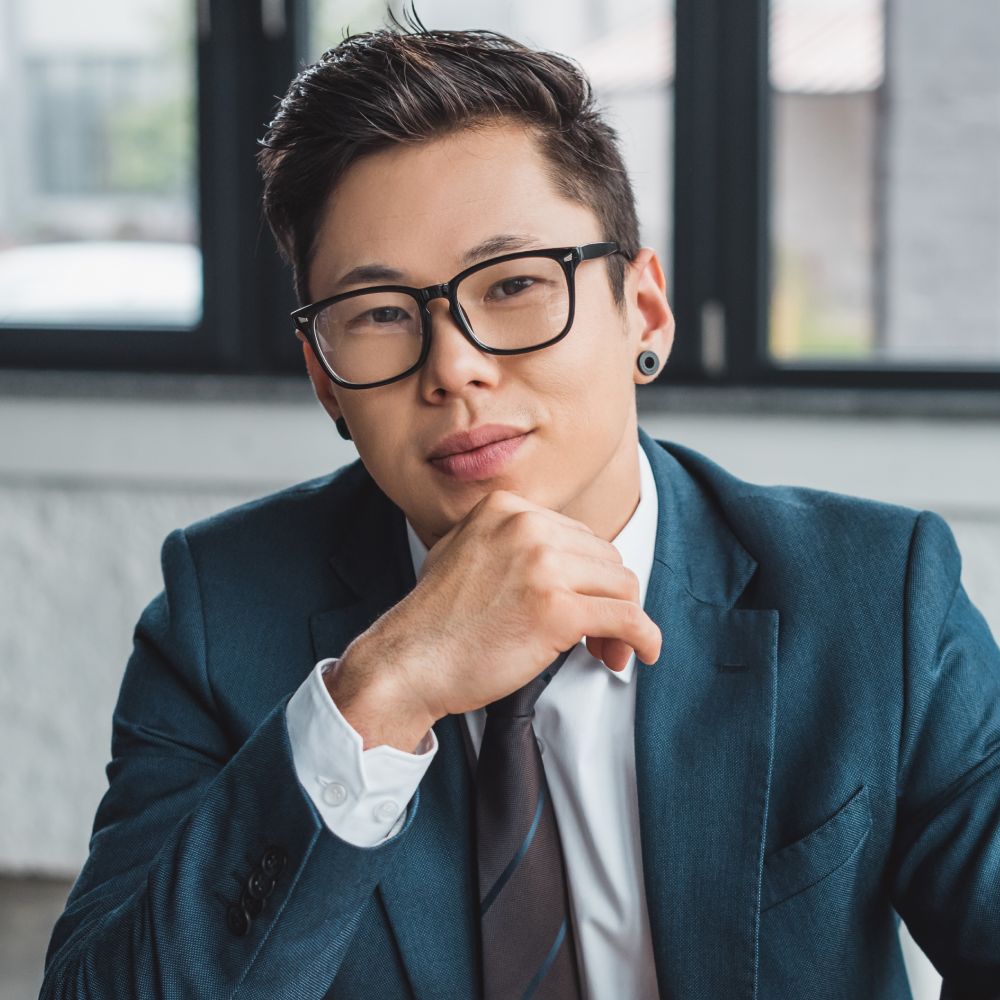 Sale handsome young asian businessman in suit and eyegl qnr7z5e 1.jpg